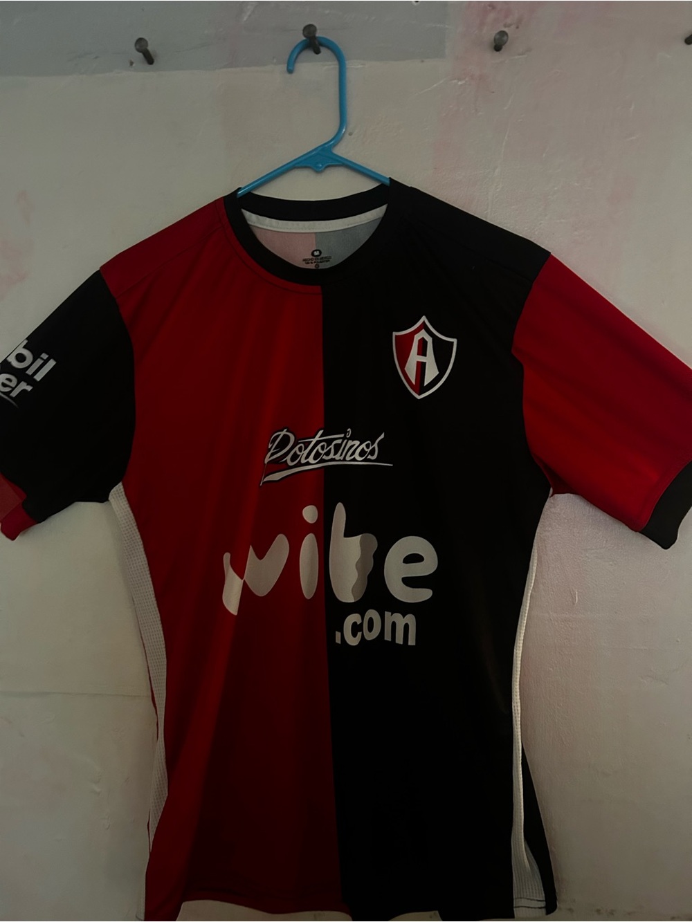 Athletic Two-Tone Red & Black Soccer Jersey with Team Crest
